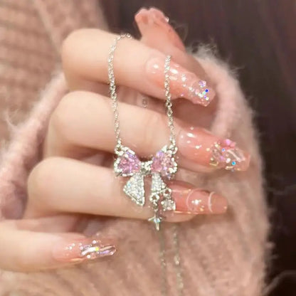 Korea Bowknot Pink Zircon Cross Pendant Necklace – Fashionable Clavicle Chain for Women, Trendy Party Jewelry