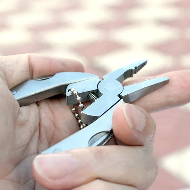 Compact Stainless Steel Multi-Tool - Portable Outdoor Keychain with Pliers, Knife, Screwdriver for Versatile Use