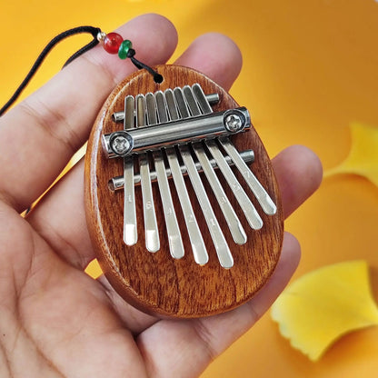 Wooden Mini Thumb Piano: Portable Musical Toy with 8 Tones - Perfect for Beginners