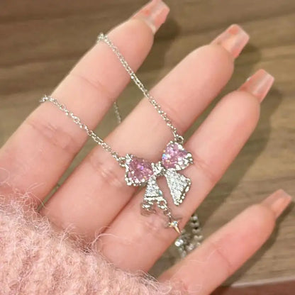 Korea Bowknot Pink Zircon Cross Pendant Necklace – Fashionable Clavicle Chain for Women, Trendy Party Jewelry