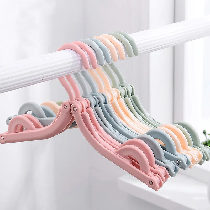 Space-Saving Foldable Plastic Clothes Hanger - Versatile, Creative, and Portable Clothing Support for Travel