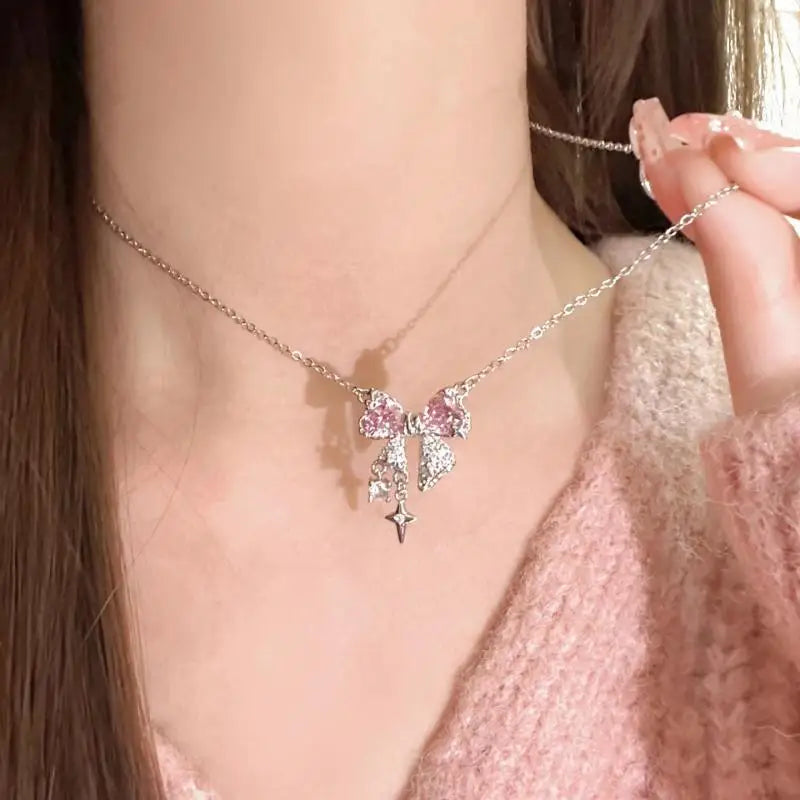 Korea Bowknot Pink Zircon Cross Pendant Necklace – Fashionable Clavicle Chain for Women, Trendy Party Jewelry