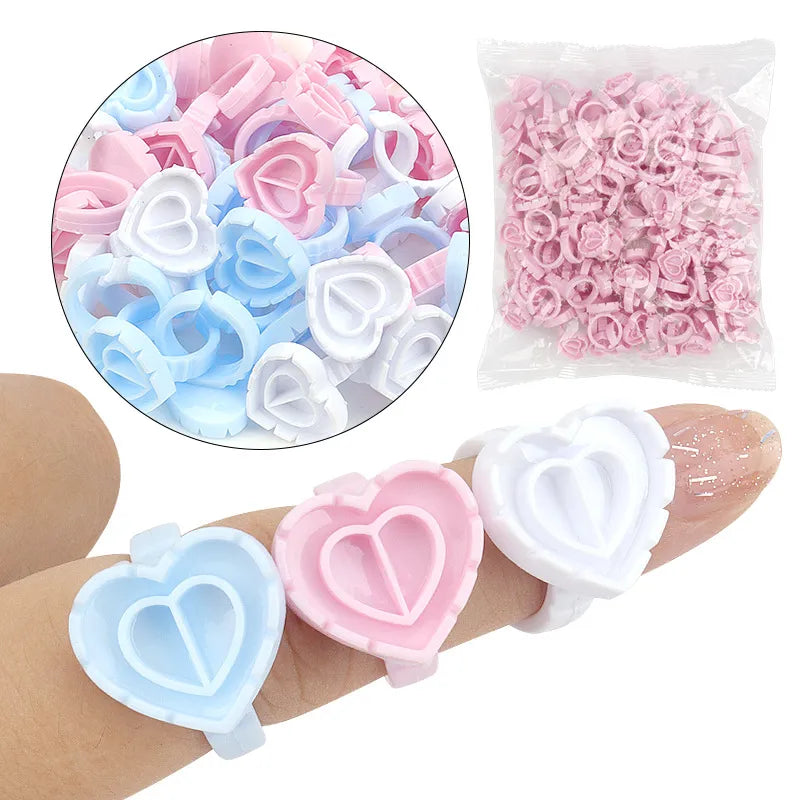 100 PCS Disposable Heart-Shaped Glue Ring Cups - Plastic Eyelash Extension Tattoo Pigment Holder Pallet, Lash Makeup Tools