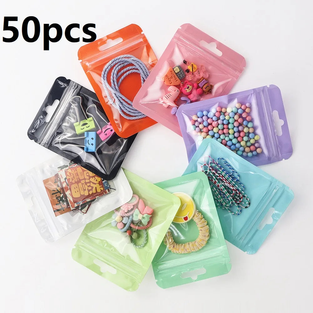 50 Pcs Holographic Transparent Mylar Bags – Colorful Plastic Self-Sealing Storage Bags for Hair, Jewelry, and Commodity Packaging