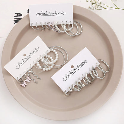 Elevate Your Style: 15 Pairs Creative Simple Lady Fake-Pearl Earrings - New Style Butterfly and Snake Designs in Silver-Color, Perfect for Adding Temperament