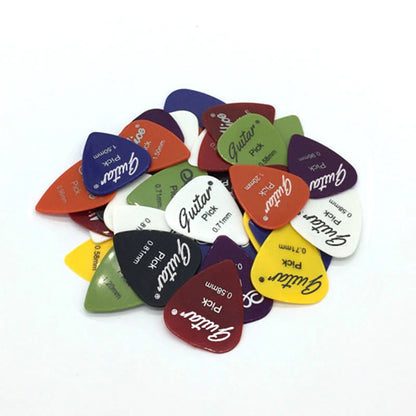 Elevate Your Guitar Playing with 50Pcs/Set Electric Guitar Pick Acoustic Music Picks Plectrum - Available in Various Thicknesses (0.58/0.71/0.81/0.96/1.20/1.50mm) - Essential Guitar Accessories